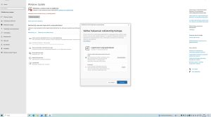 Windows Updaten näkymä Windows 10 -tietokoneella. Näytöllä näkyy ilmoitus, että Windows-version tuki on päättynyt, sekä ikkuna laajennettujen suojauspäivitysten rekisteröitymisestä. Käyttäjälle tarjotaan vaihtoehto kirjautua Microsoft-tilillä ilman lisämaksua tai ostaa kertamaksullinen suojauspäivitys.